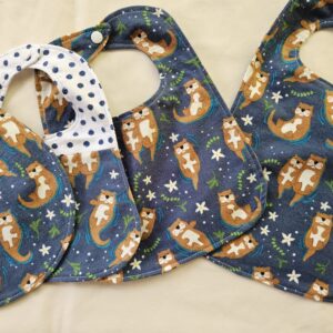 Swimming Otters Bibs and Burp Cloths